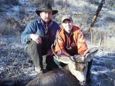 Kristi and her first good mule deer.